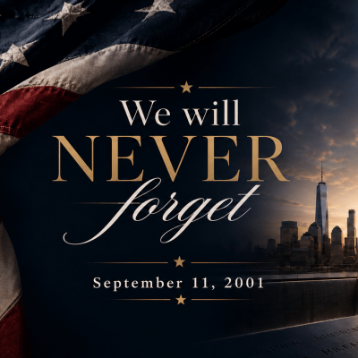 9/11 Never Forget memorial flag with American flag, NYC skyline and light beams